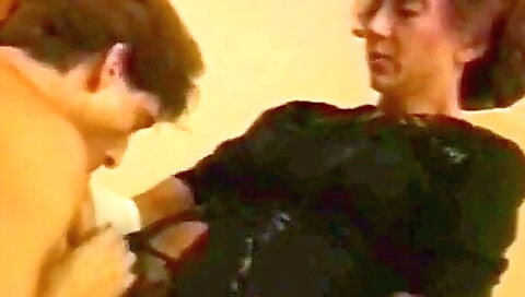 Mature bitch gets fucked in her ass with a strapon