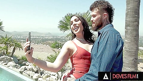 Brunette girl in stockings is on top of her lover's dick