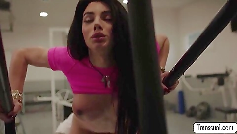 A big tit brunette is getting anally fucked in the gym