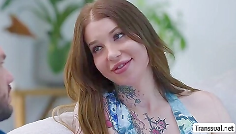 Tall tattooed tranny gets me on a table and fucked from behind